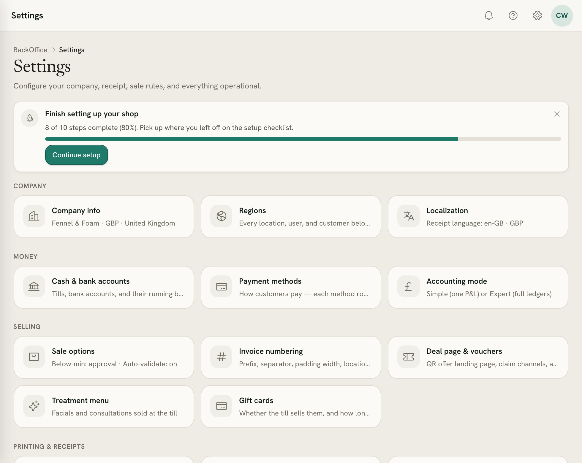 The Settings hub on a computer: the setup checklist banner, then the tiles grouped under Company, Money and Selling, each with a short grey line under its name